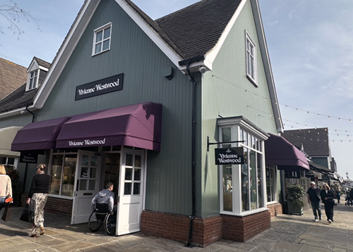 Vivienne Westwood storefront in UK outlet village.